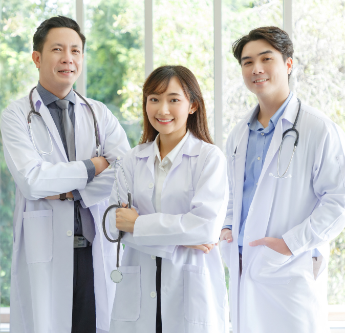 image with three doctors smiling